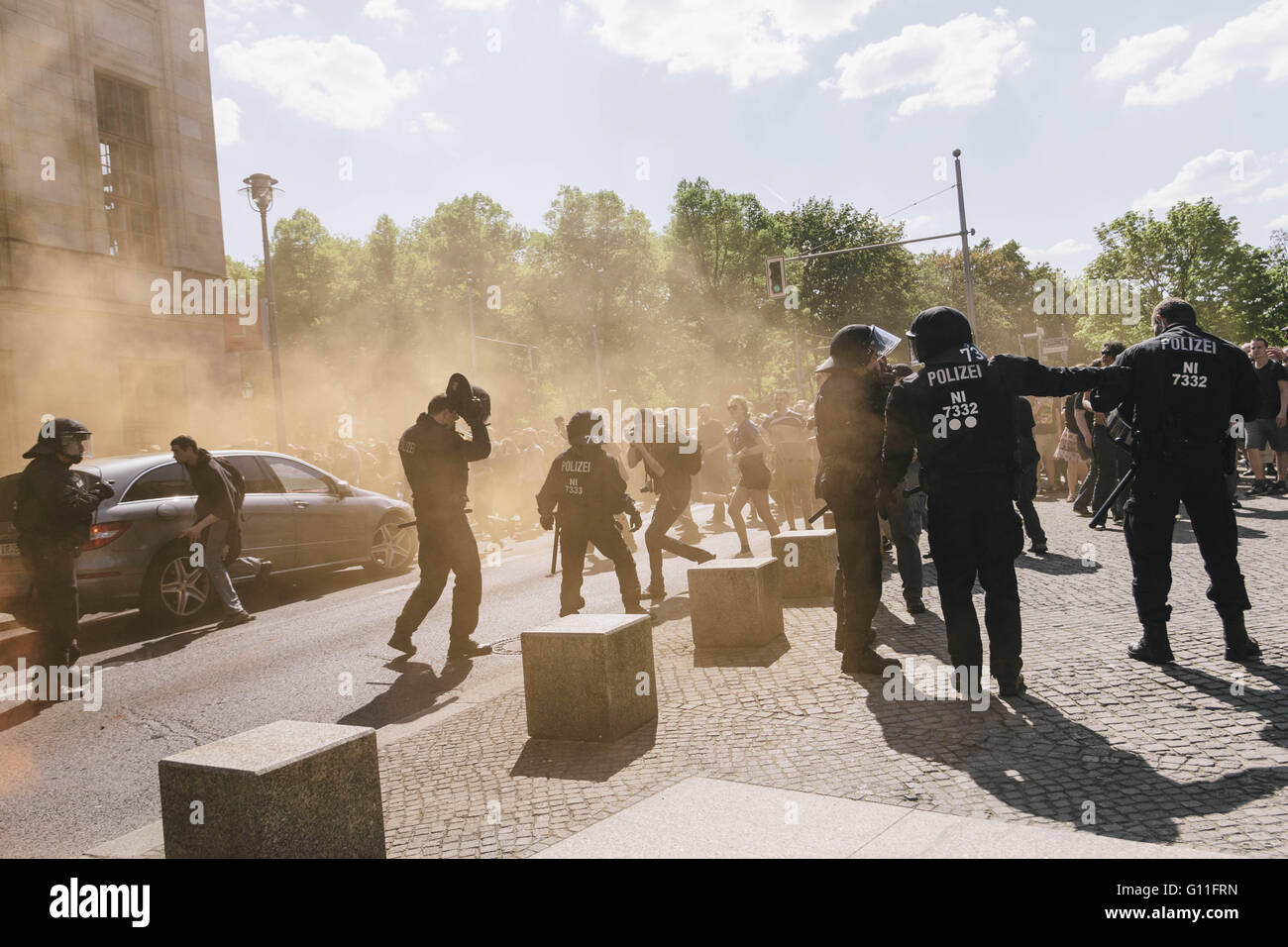 Berlin, Berlin, Germany. 7th May, 2016. Police secures a road after protesters break through a police barrier during the counter protests against the rally held under the motto 'Merkel muss weg![Merkel must go]' organised by far-right group 'We for Berlin & We for Germany' Credit:  Jan Scheunert/ZUMA Wire/Alamy Live News Stock Photo