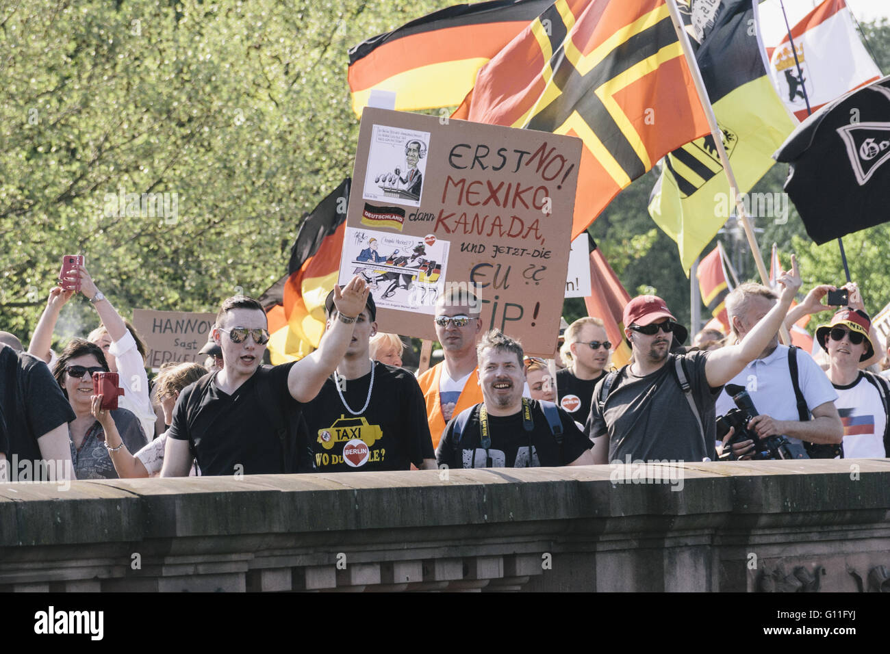 Berlin, Berlin, Germany. 7th May, 2016. Protesters react to counter-activists near Berlin central station during the rally held under the motto 'Merkel muss weg![Merkel must go]' organised by far-right group 'We for Berlin & We for Germany' Credit:  Jan Scheunert/ZUMA Wire/Alamy Live News Stock Photo