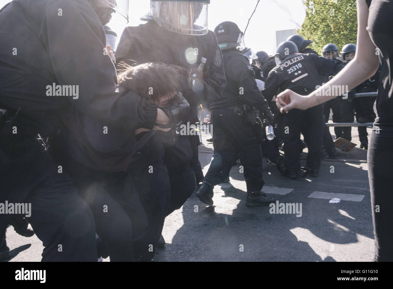Berlin, Berlin, Germany. 7th May, 2016. An activist is arrested by the police during the counter protests against rally held under the motto 'Merkel muss weg![Merkel must go]' organised by far-right group 'We for Berlin & We for Germany' Credit:  Jan Scheunert/ZUMA Wire/Alamy Live News Stock Photo