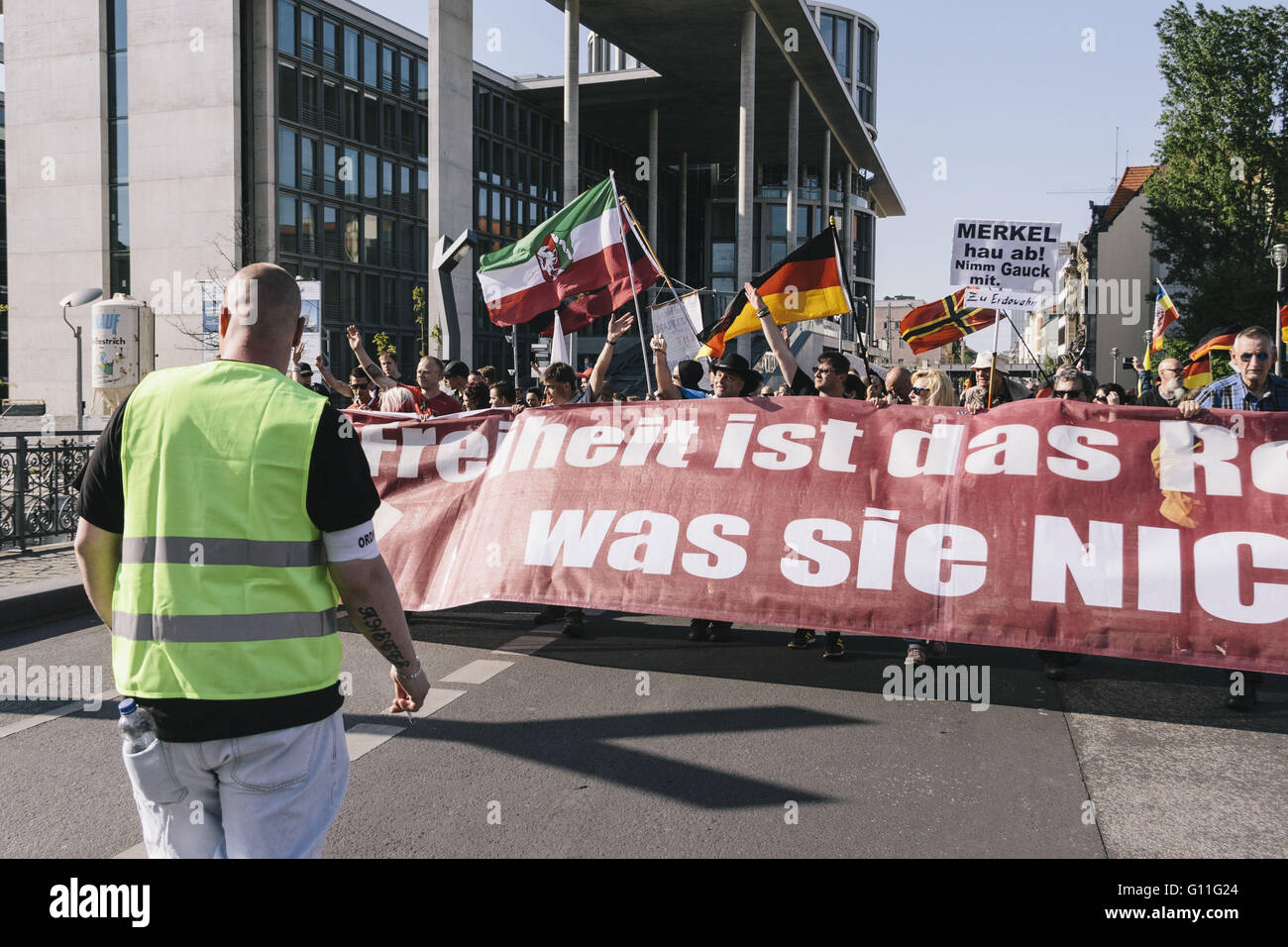 Berlin, Berlin, Germany. 7th May, 2016. Protesters react to counter-activists near Berlin Reichstag during the rally held under the motto 'Merkel muss weg![Merkel must go]' organised by far-right group 'We for Berlin & We for Germany' Credit:  Jan Scheunert/ZUMA Wire/Alamy Live News Stock Photo