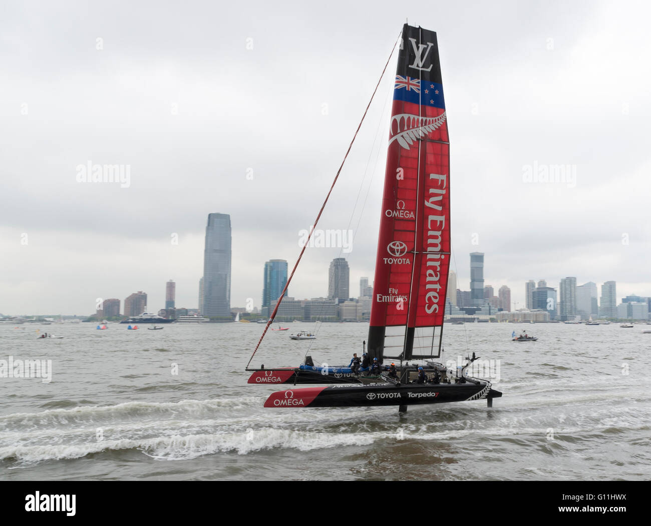 Emirates New Zealand team sailing yacht foiling in the 2016 America's Cup World Series in New