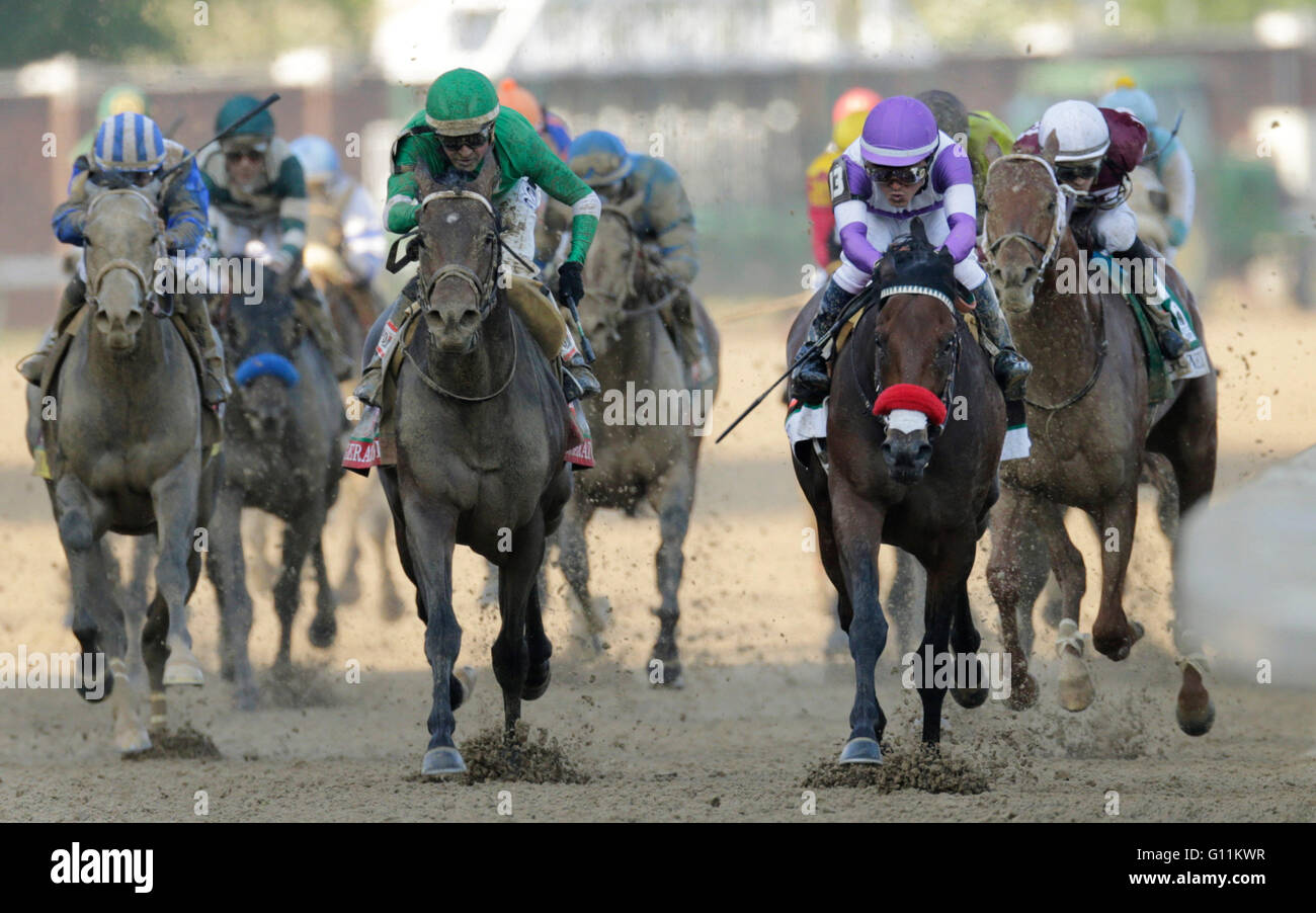 Louisville, Ky, US. 7th May, 2016. Nyquist with Mario Gutierrez up, on the inside with purple silks, approached the finish line to win the 142nd running of the Kentucky Derby at Churchill Downs in Louisville, Ky, on May 7, 2016. Credit:  Lexington Herald-Leader/ZUMA Wire/Alamy Live News Stock Photo