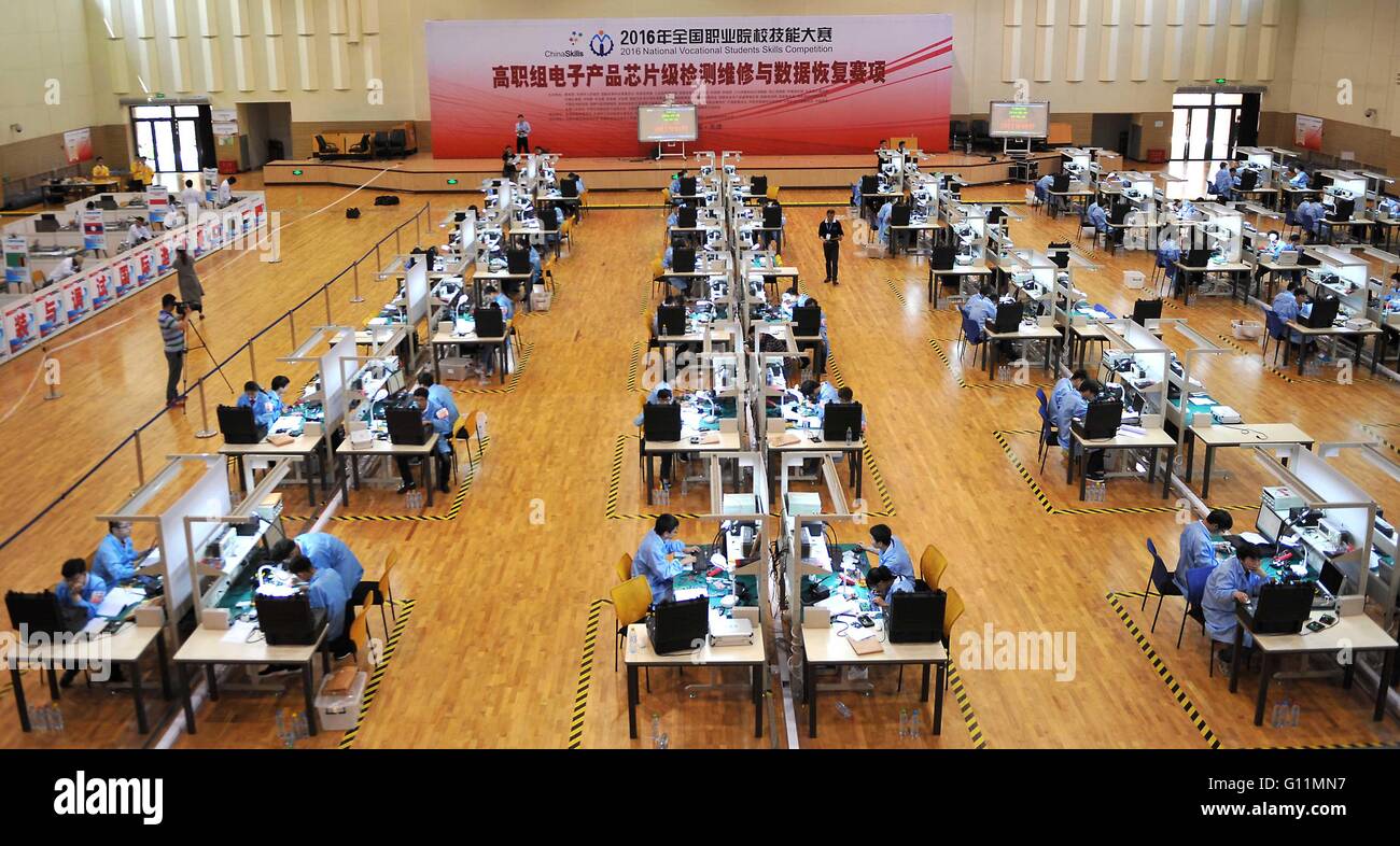 Tianjin. 8th May, 2016. Students take part in a chip repair and data recovery match during the 2016 National Vocational Students Skills Competition in north China's Tianjin, May 8, 2016. More than 10,000 students participated in 94 matches of the competition here on Sunday. © Lian Yi/Xinhua/Alamy Live News Stock Photo