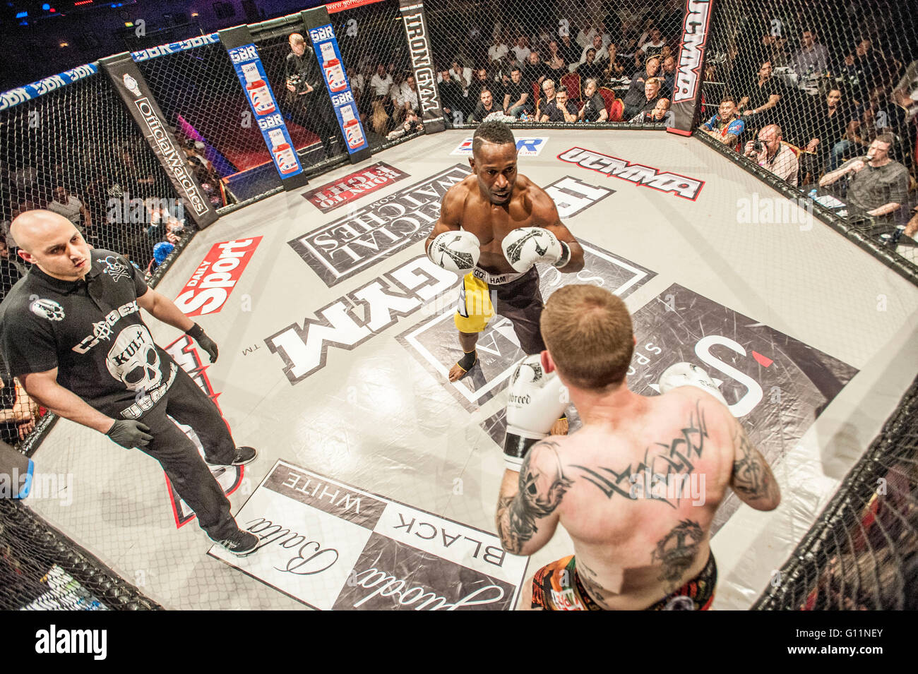 London, UK. 8th May 2016. UCMMA mixed martial arts cage fight competitors compete at the Troxy. Kris King vs Anthony Kannike in yellow shorts winner Credit:  roger parkes/Alamy Live News Stock Photo