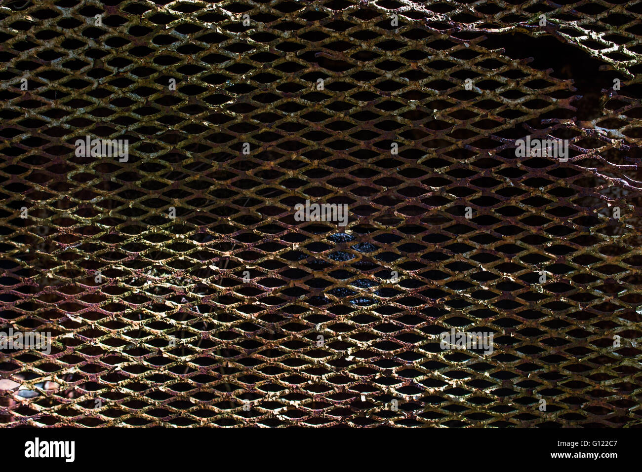 Corroded and rusting metal mesh - clearwell caves. Stock Photo