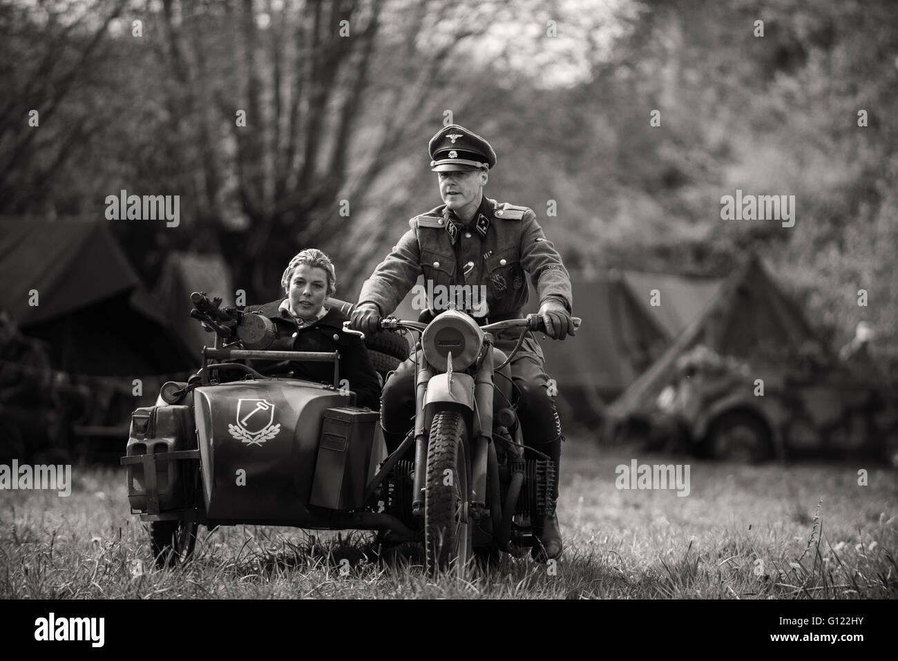 German SS officer riding a motorcycle and side car - Fortress wales mulit-period re-enactment event at Caldecot Castle Stock Photo