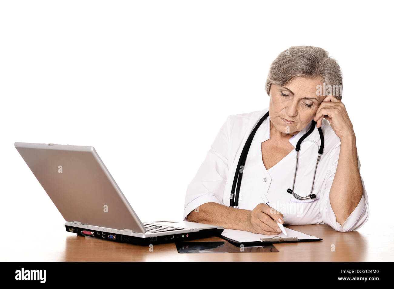 Thoughtful senior doctor Stock Photo - Alamy