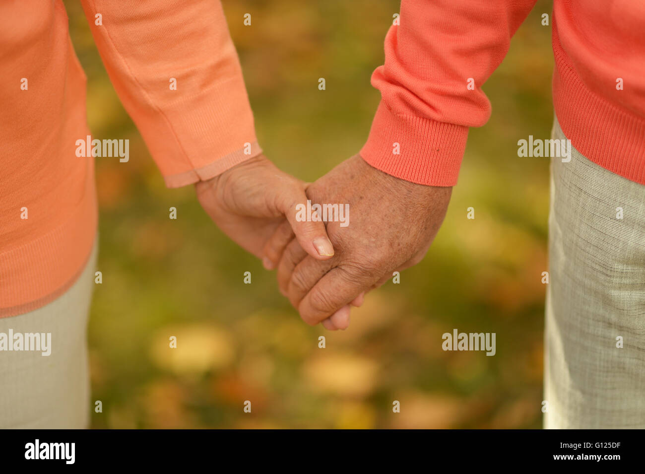 Hands held together Stock Photo Alamy