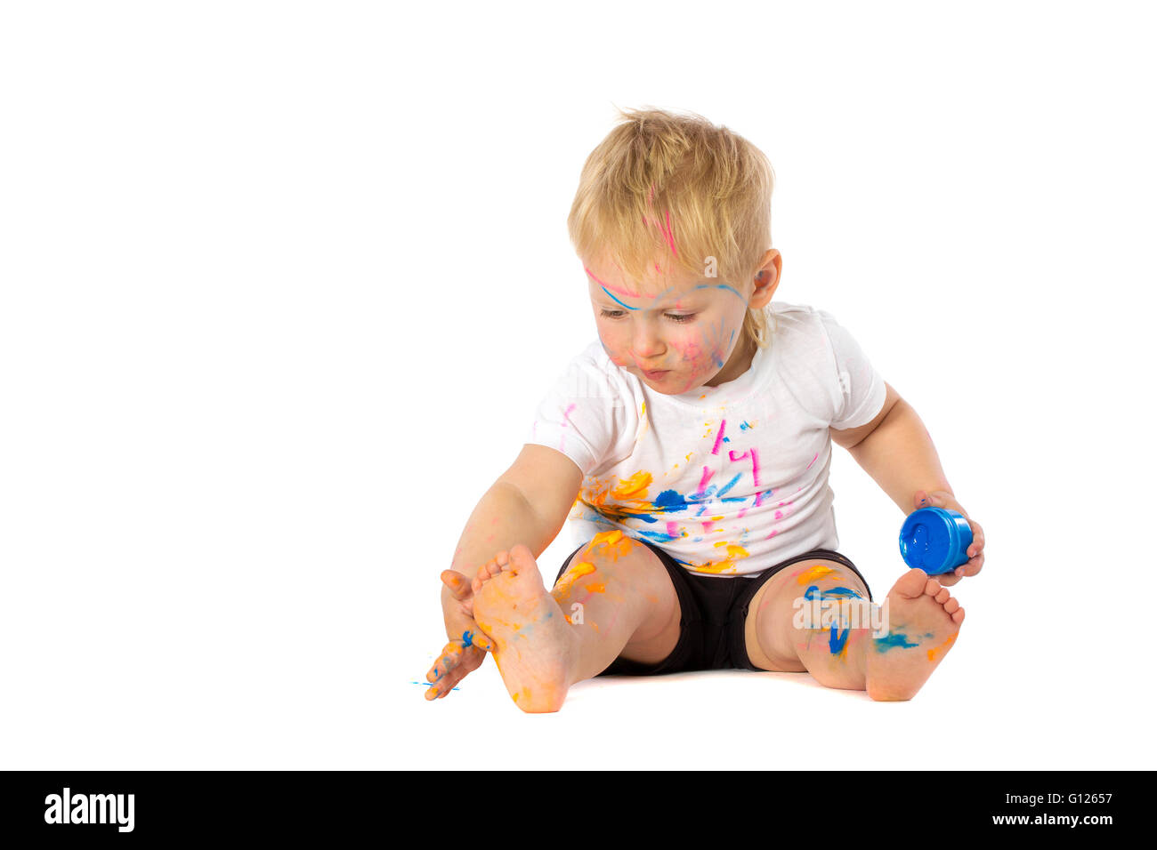 Kid playing with paint hi-res stock photography and images - Alamy