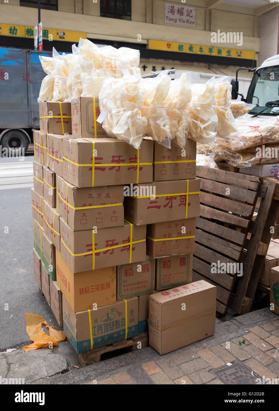 Boxes stacked up in a street in Hong Kong Stock Photo Alamy