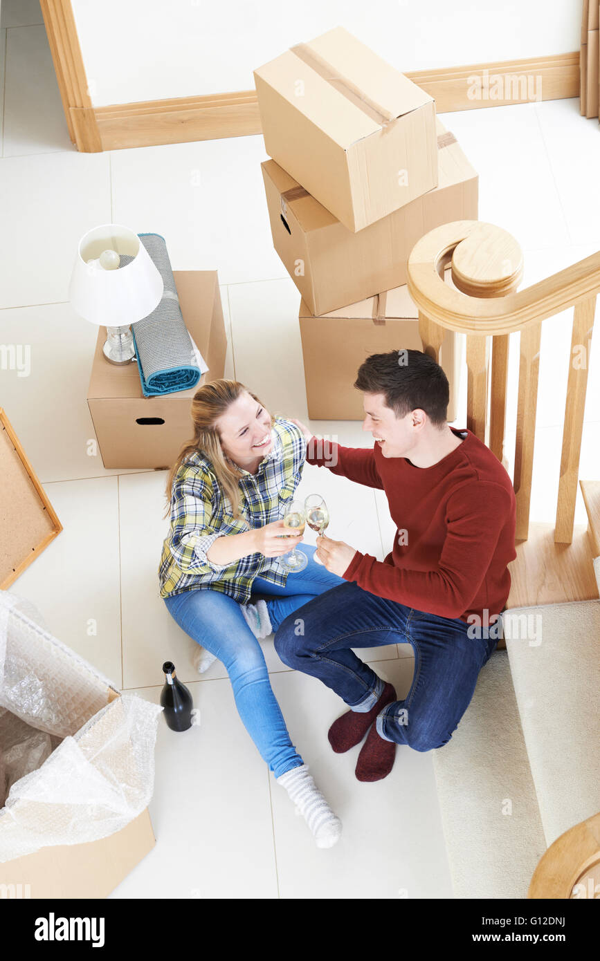 Celebrating home couple hi-res stock photography and images - Alamy