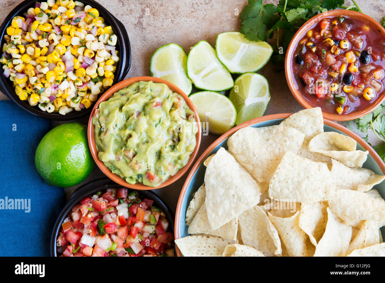 Tortilla chips served with guacamole, salsa, and pico de gallo, view