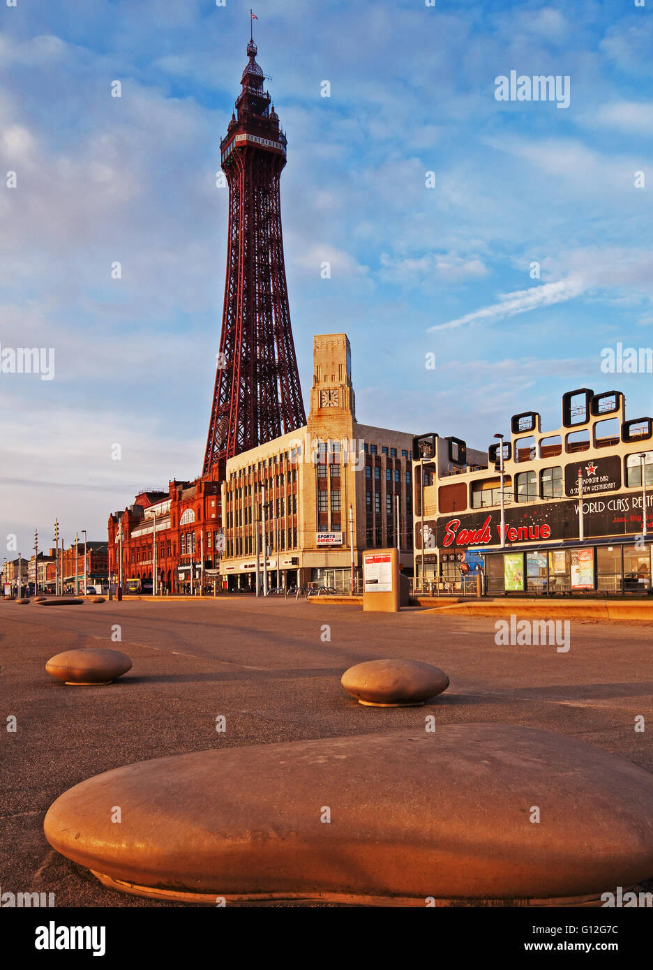 Viewing the refurbished tower from Blackpool's promenade, in warm evening light Stock Photo