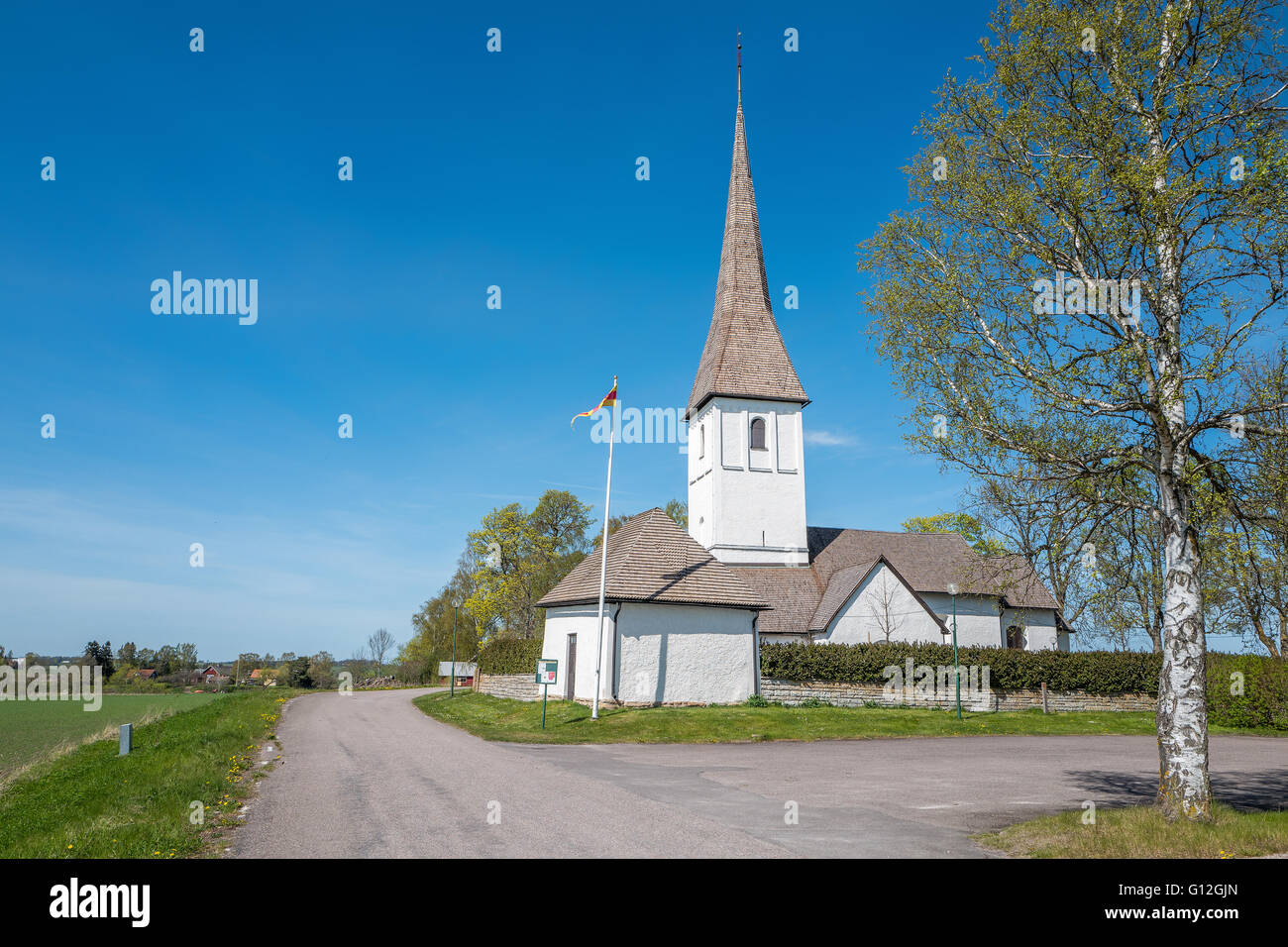 Kaga church during spring in Sweden. This is a medieval countryside church. Stock Photo