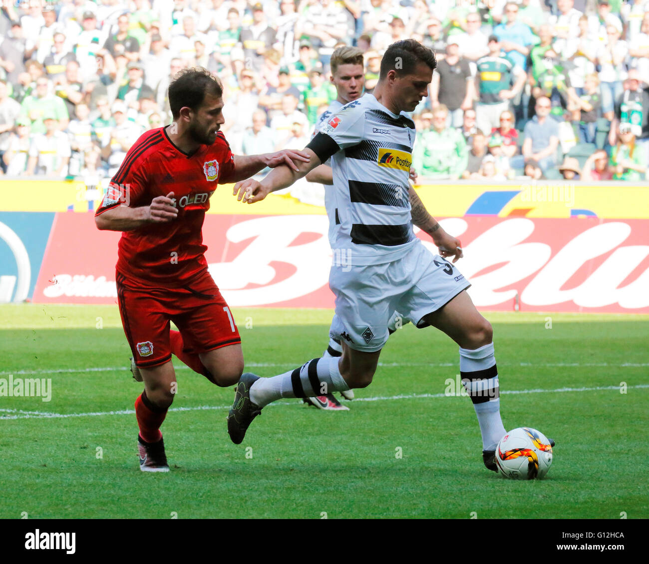 sports, football, Bundesliga, 2015/2016, Borussia Moenchengladbach versus Bayer 04 Leverkusen 2:1, Stadium Borussia Park, scene of the match, Granit Xhaka (MG) in ball possession, left Admir Mehmedi (Bayer) Stock Photo