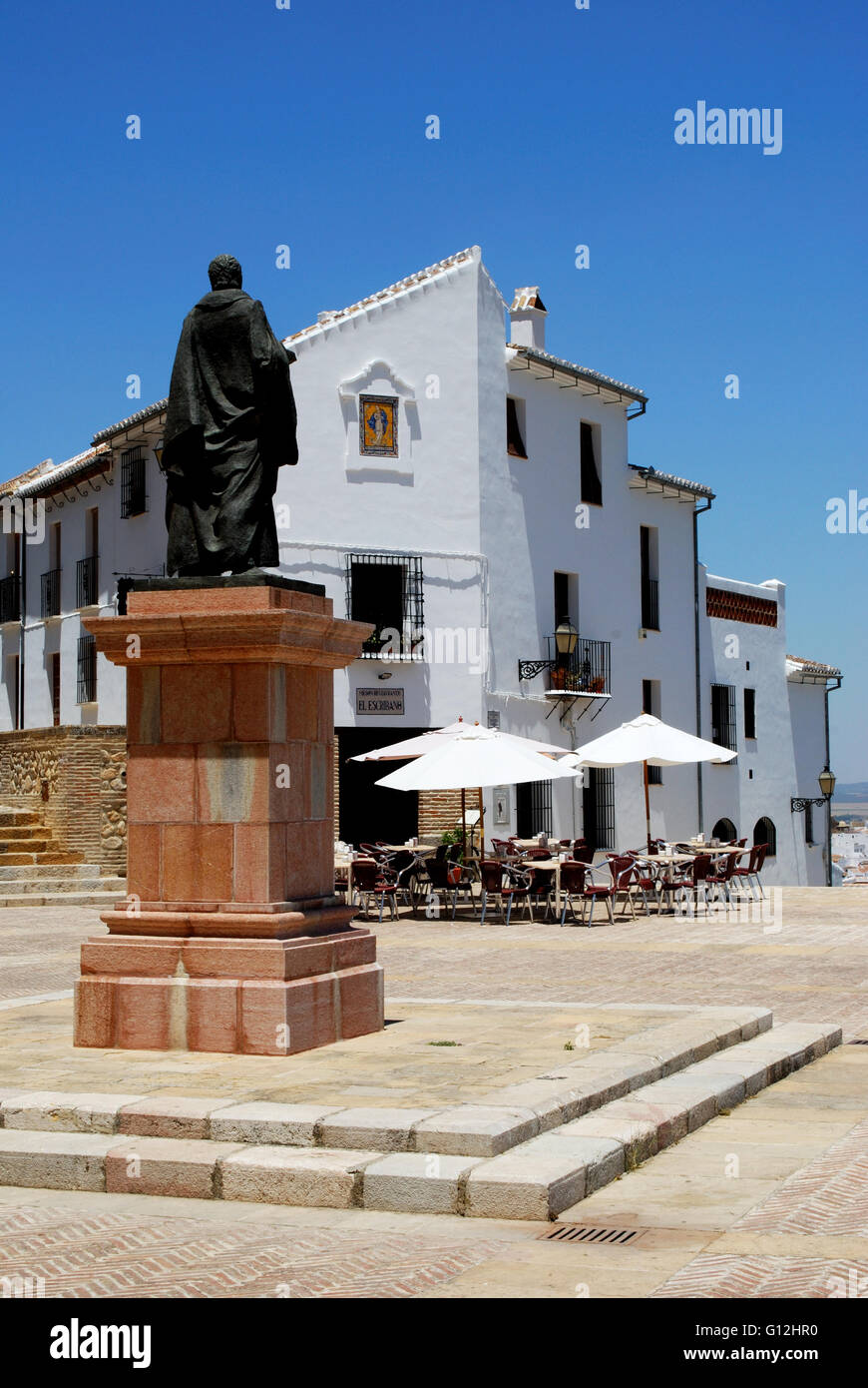 Statue of Pedro Espinosa in the Plaza de Santa Maria with a pavement cafe  and the giants arch to the rear, Antequera, Spain Stock Photo - Alamy