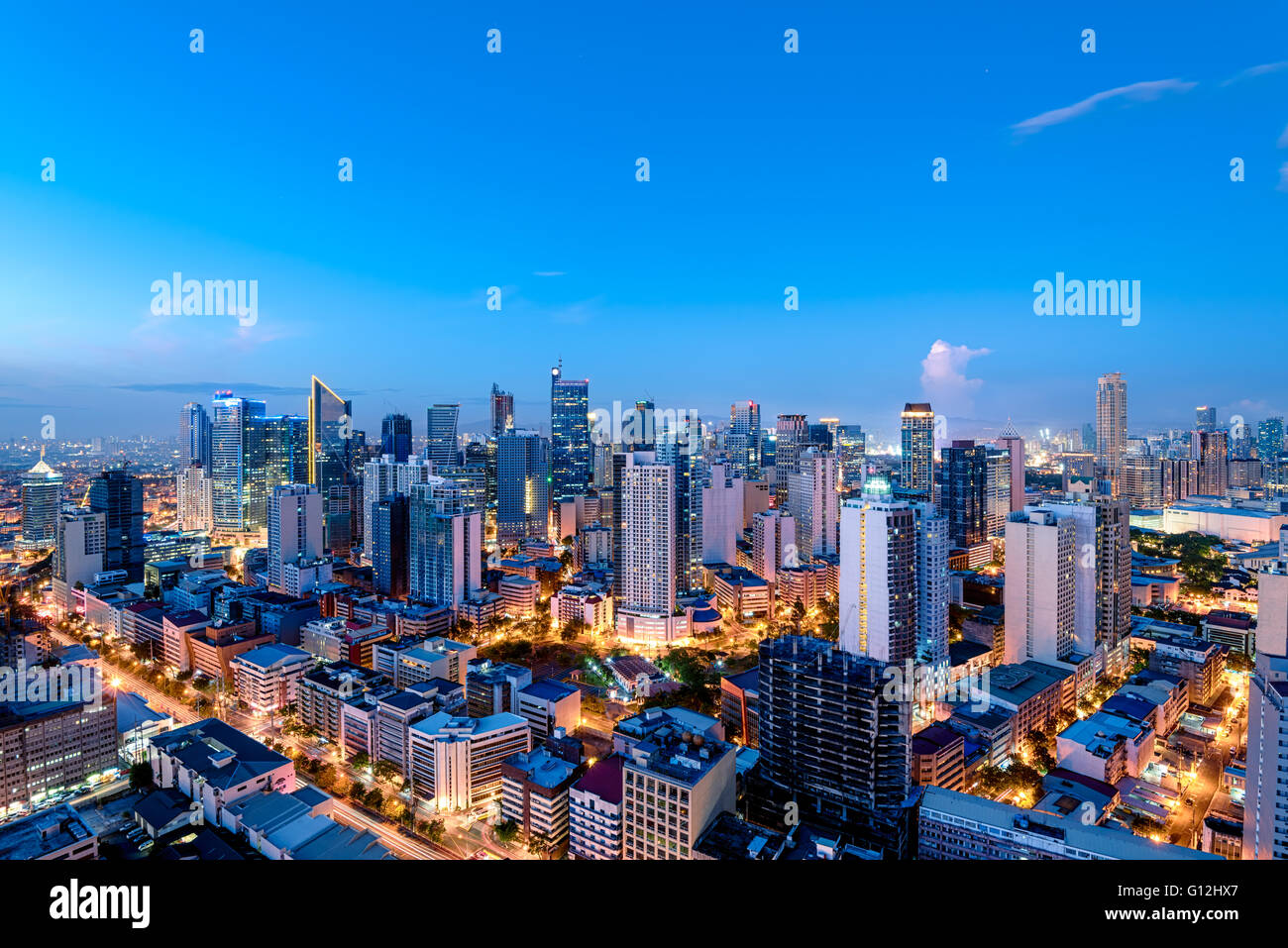 Elevated, night view of Makati, the business district of Metro Manila. Stock Photo