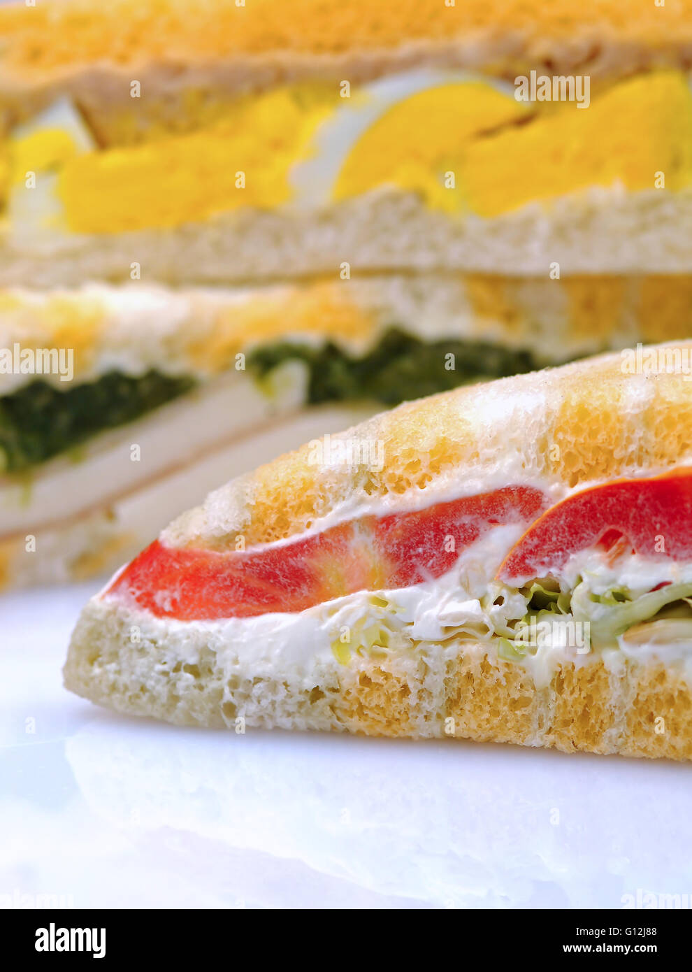 Colorful sandwich isolated on white Stock Photo Alamy