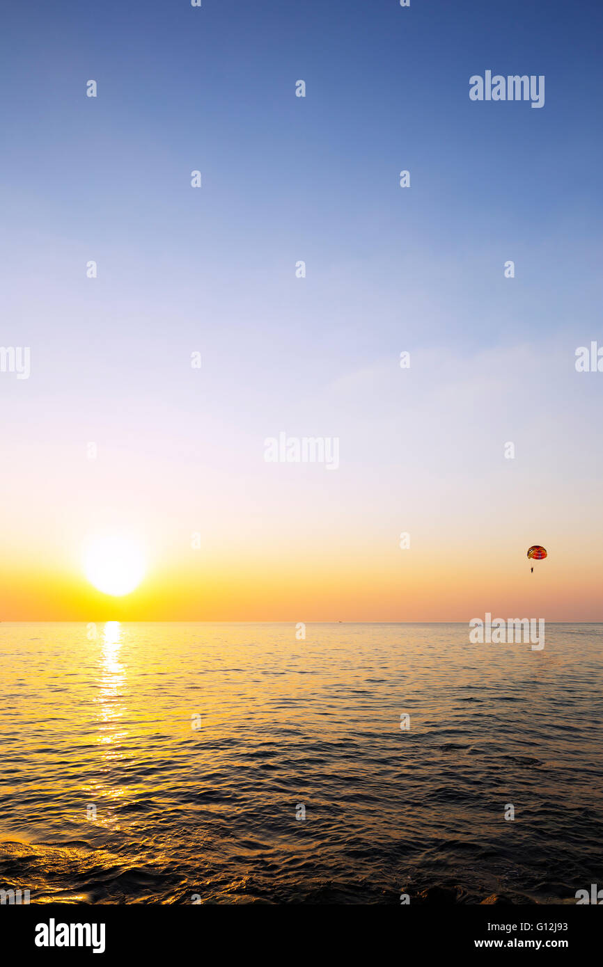 South East Asia, Vietnam, Phu Quoc island, Vinpearl Resort, paraponting at sunset Stock Photo