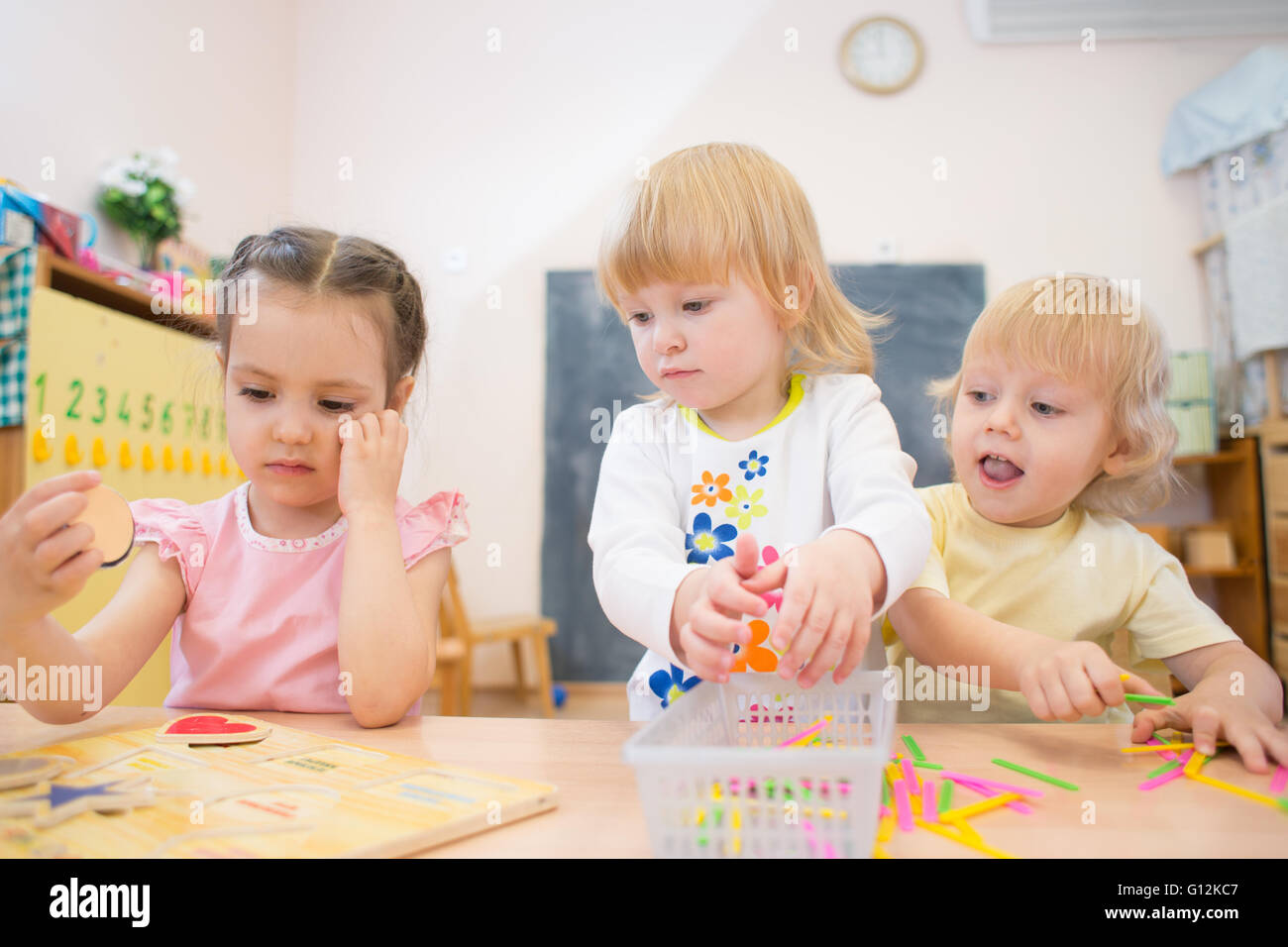 Kids Playing Board Games Stock Photos & Kids Playing Board Games Stock