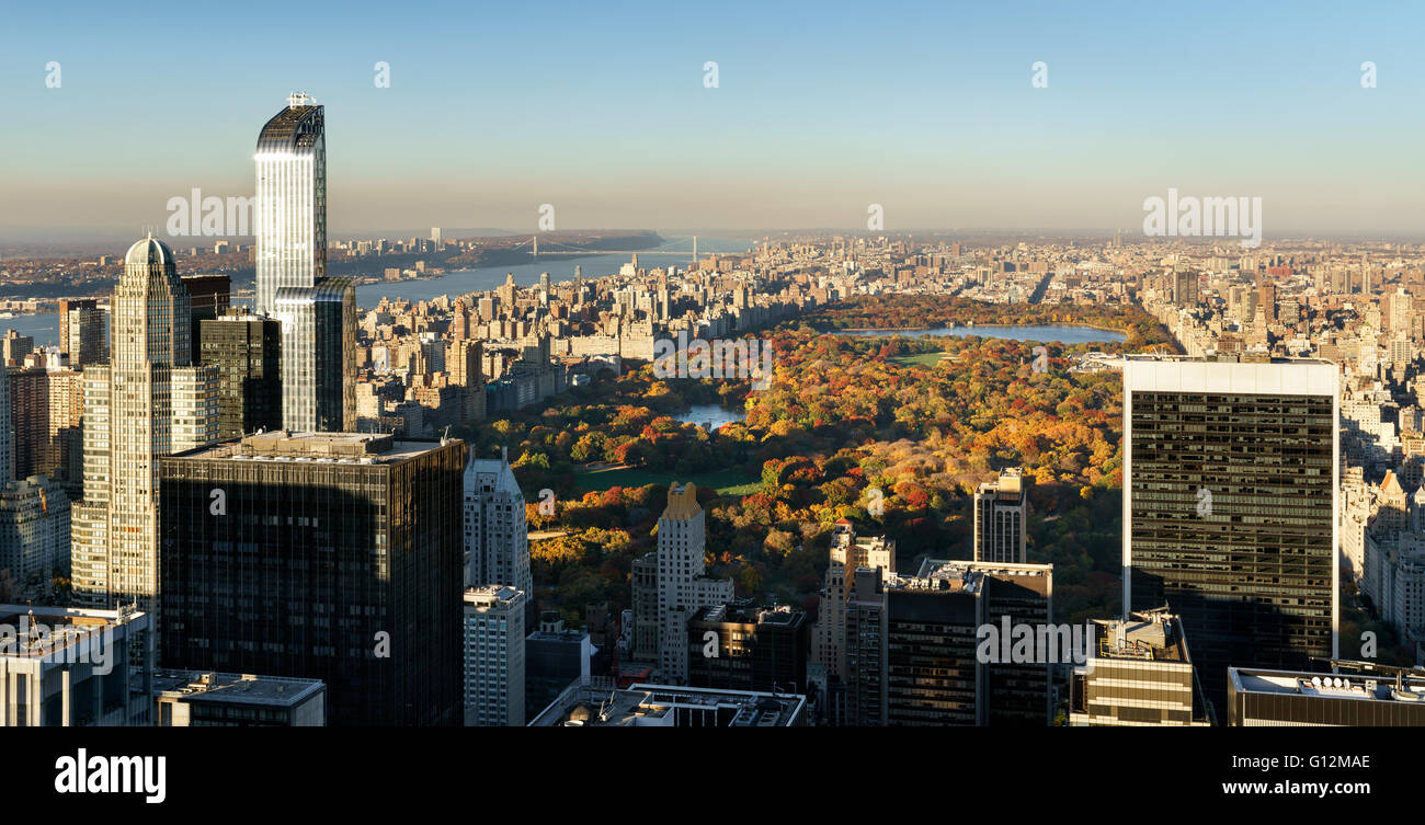 Aerial View, Central Park in Fall with Midtown skyscrapers, New York. Also includes Upper West Side, Upper East Side and Harlem Stock Photo