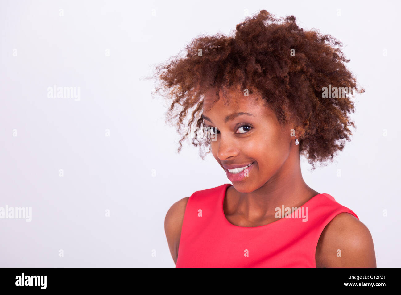 Young black African American woman with frizzy afro hair Stock Photo