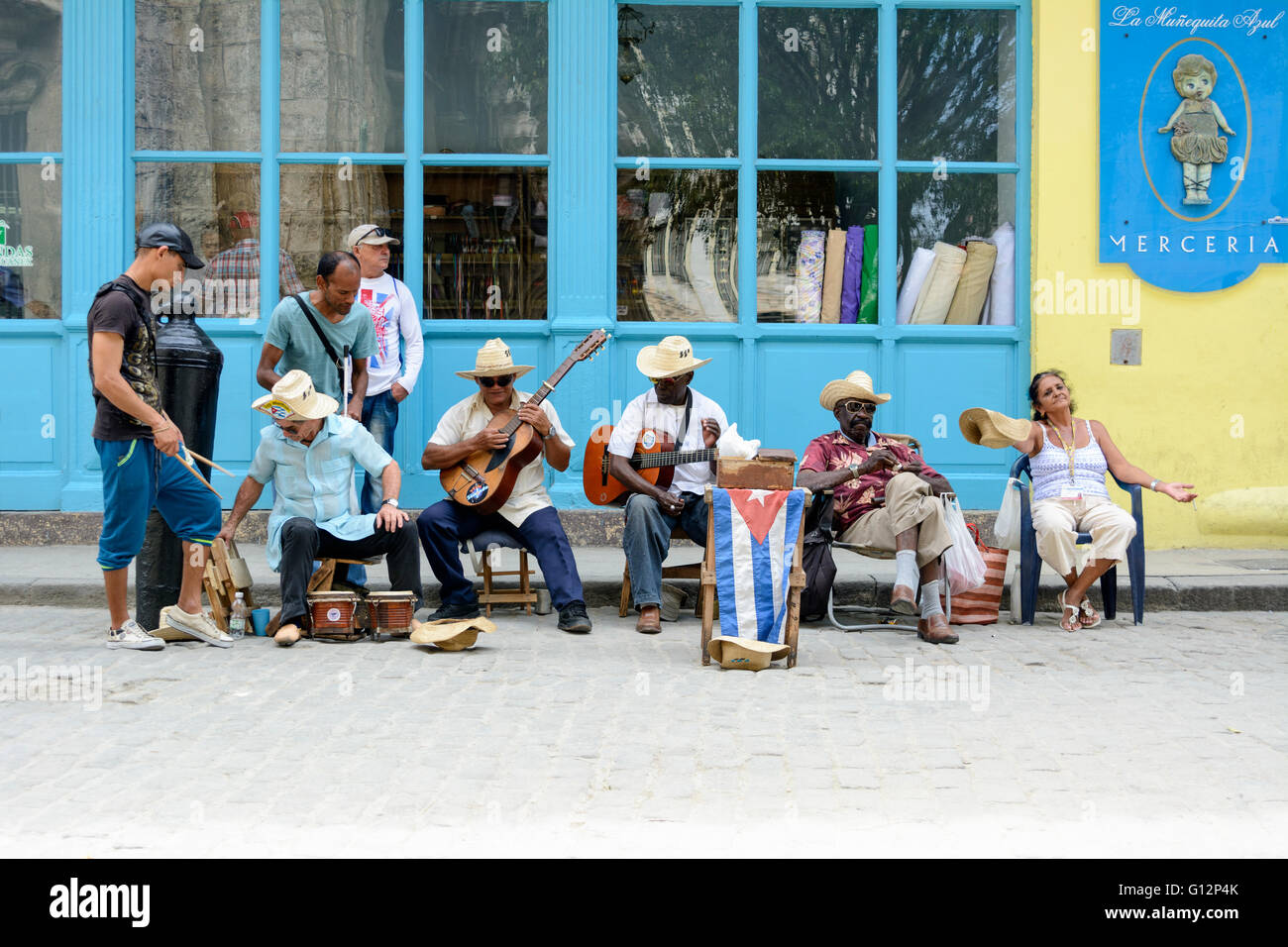 Street musicians perform for tourists and tips in Old Havana, Havana, Cuba Stock Photo