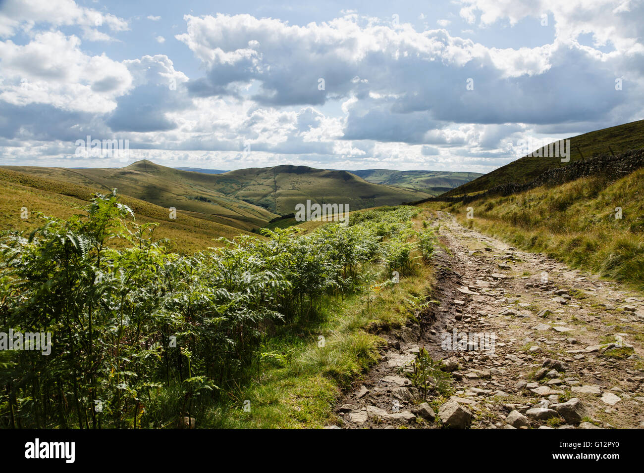 Old packhorse track near Edale Cross and view towards South Head and Mount Famine, Peak District National Park, Derbyshire Stock Photo