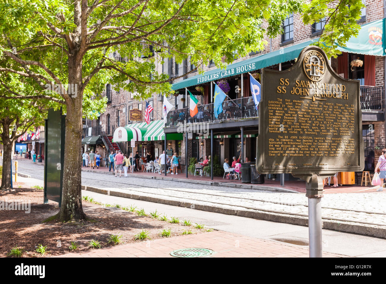 People stroll along River Street, a tourist area and shopping district in Savannah, Georgia. Stock Photo