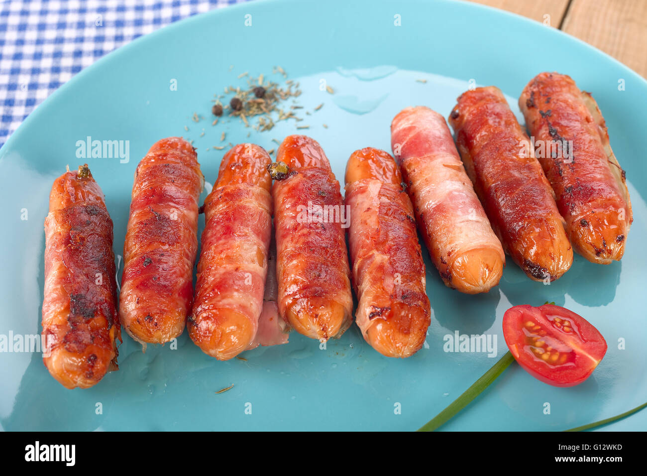 sausages with bacon Stock Photo Alamy