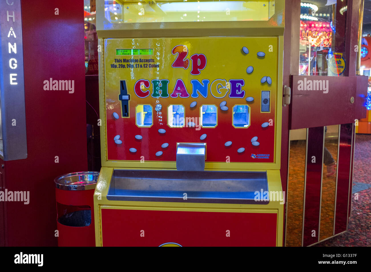 2p change machine at an Amusement arcade on Morecambe seafront, UK Stock Photo