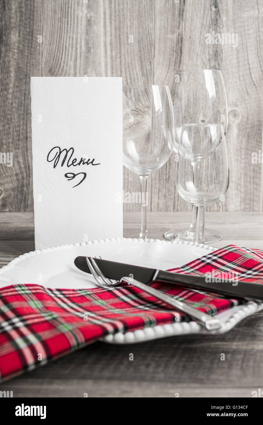 Table setting in rustic style with Menu Stock Photo - Alamy
