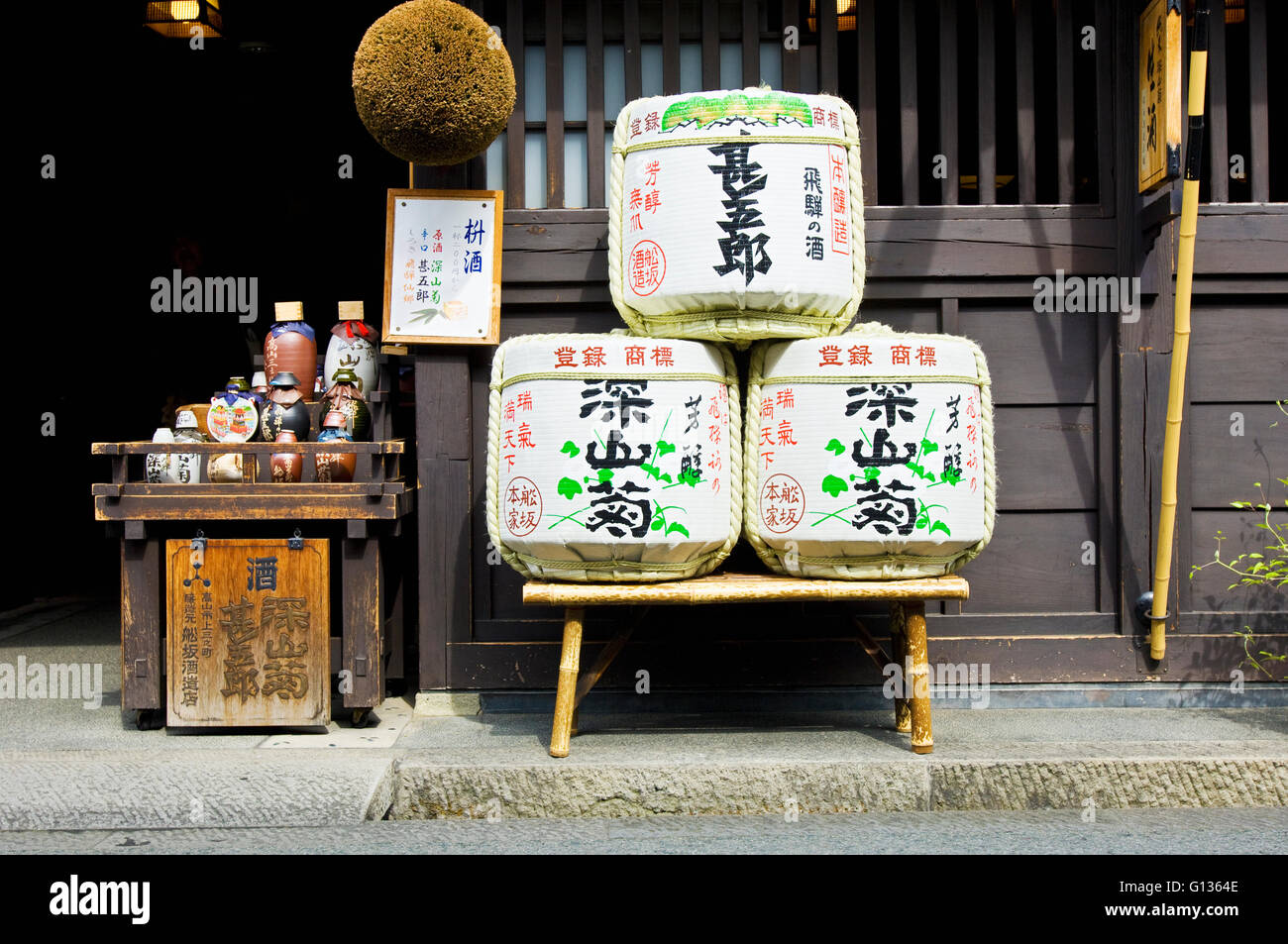 Sake casks outside an old sake brewery in a traditional shopping street in Takayama Japan Stock Photo