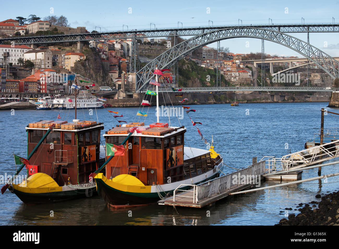 Portugal, city of Porto, tour boats for sightseeing cruise on Douro River, Dom Luis I Bridge Stock Photo