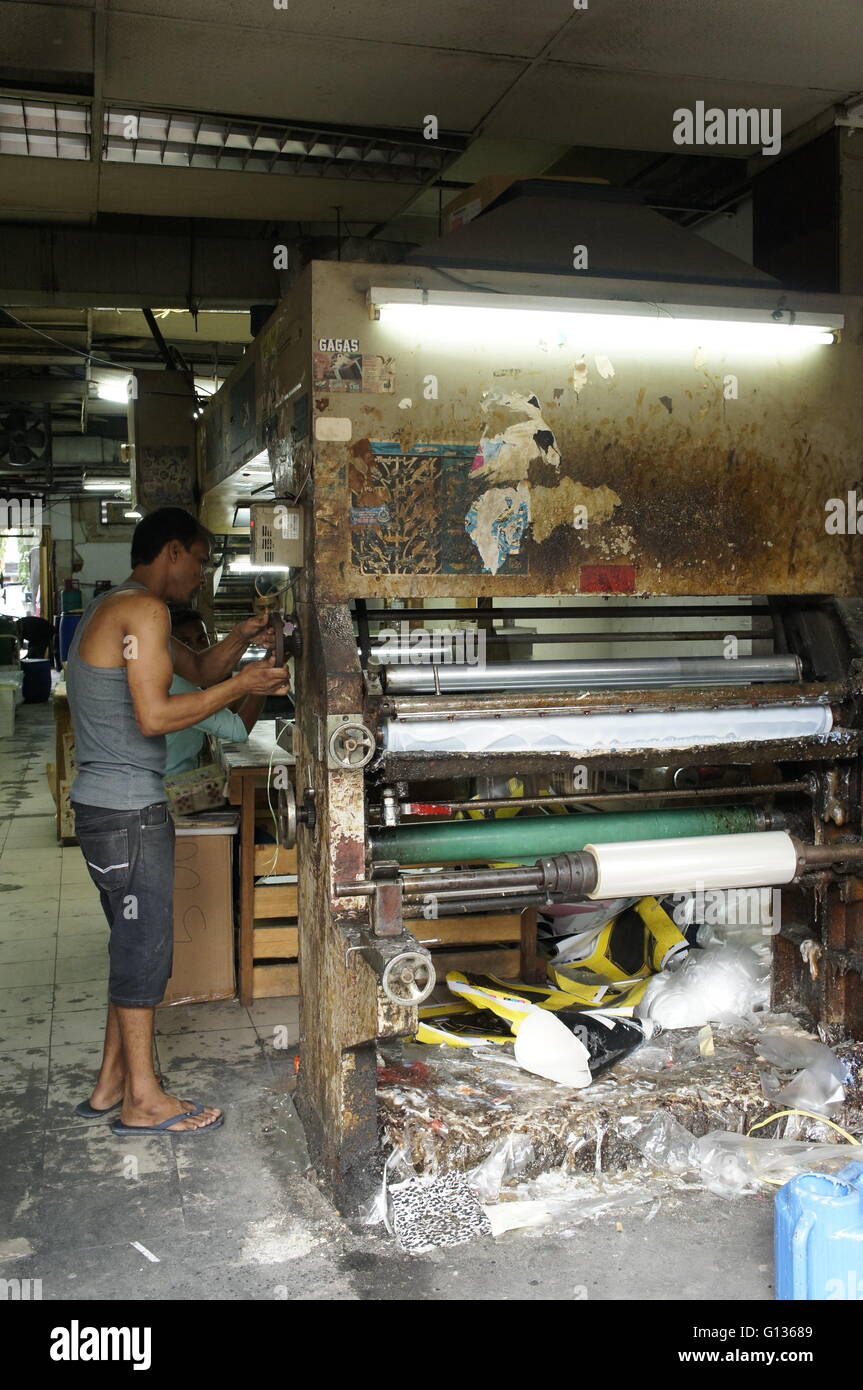 banner printing machine at a printers shop in Kuala Lumpur, Malaysia Stock Photo