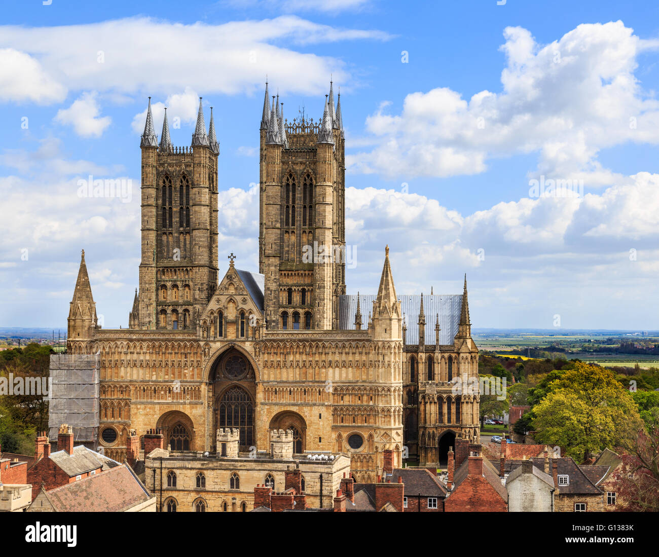 Front of Lincoln Cathedral. Scaffolding present on NW corner. Viewed from the walls of Lincoln Castle. Stock Photo