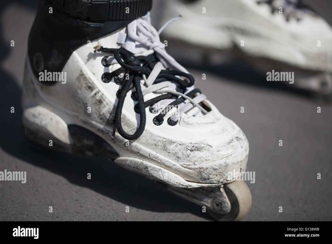 Rollerblader wearing professional extreme inline skates made for tricks