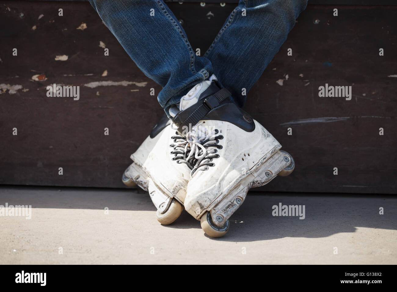 Rollerblader wearing professional extreme inline skates made for tricks