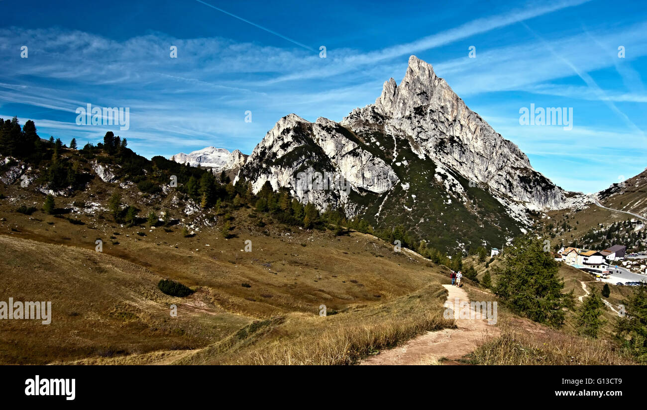 Sass de Stria peak with Passo Falzarego and hiking trail in autumn Dolomites mountains near Cortina d'Ampezzo Stock Photo