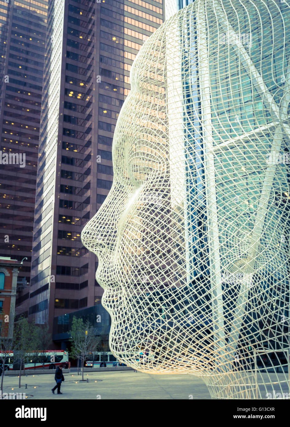 A view of the sculpture Wonderland by Jaume Plensa, in front of The Bow  skyscraper in Calgary, Alberta, Canada Stock Photo - Alamy