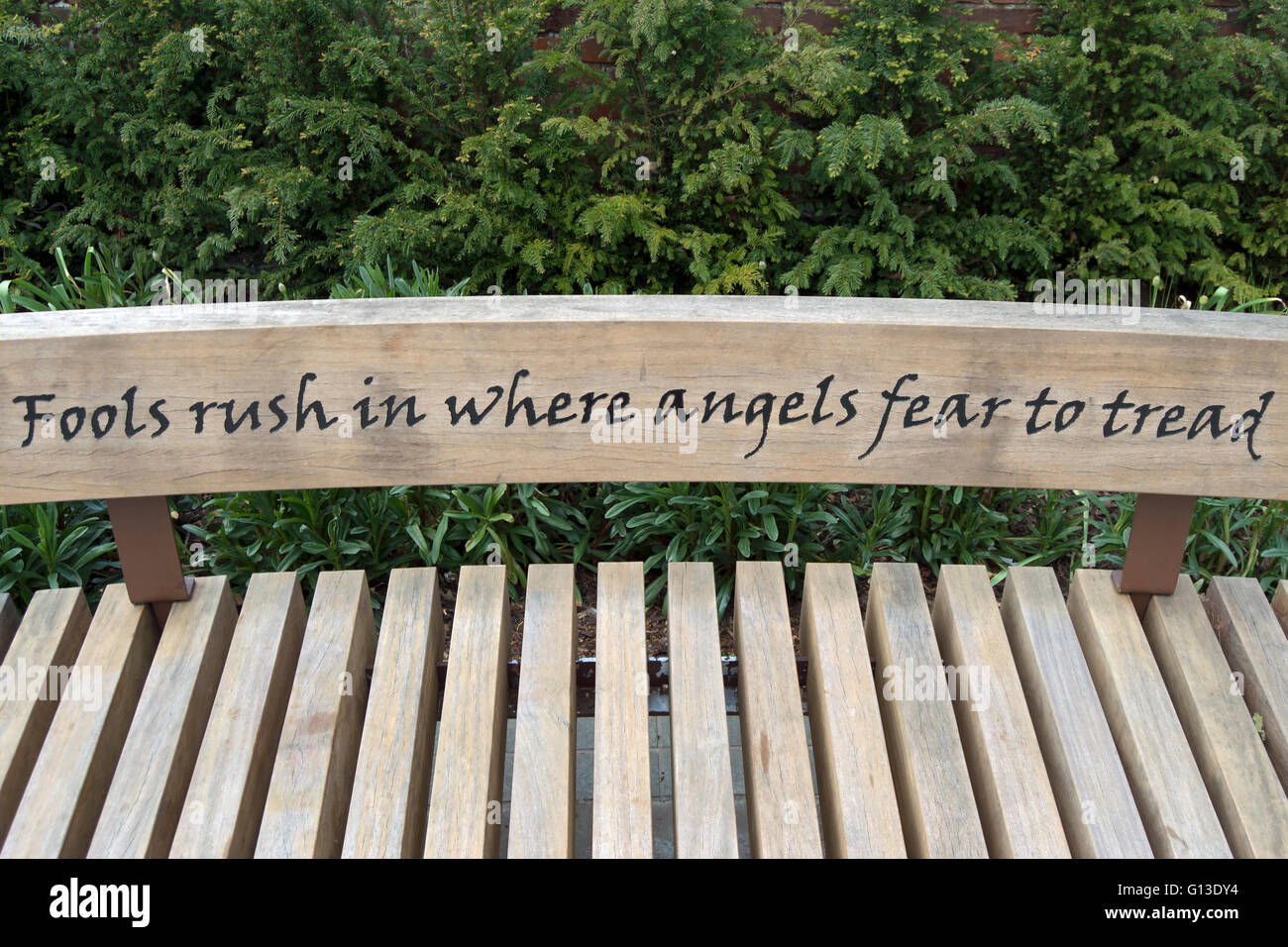 an alexander pope quote, from an essay on criticism, on a bench in twickenham, middlesex, england Stock Photo