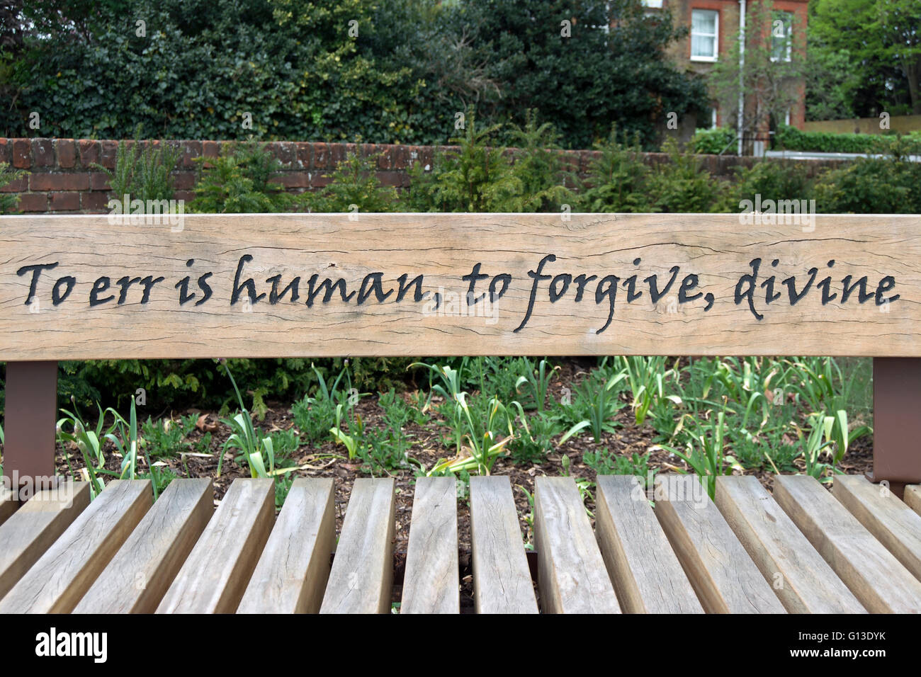 an alexander pope quote, from an essay on criticism, on a bench in twickenham, middlesex, england Stock Photo