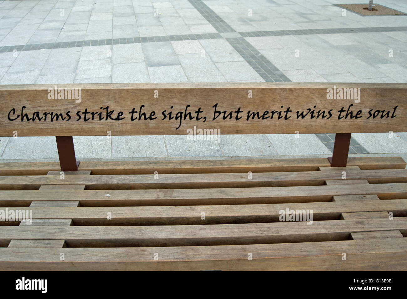 Alexander Pope Quote: Charm strikes the sight, but merit wins the soul.