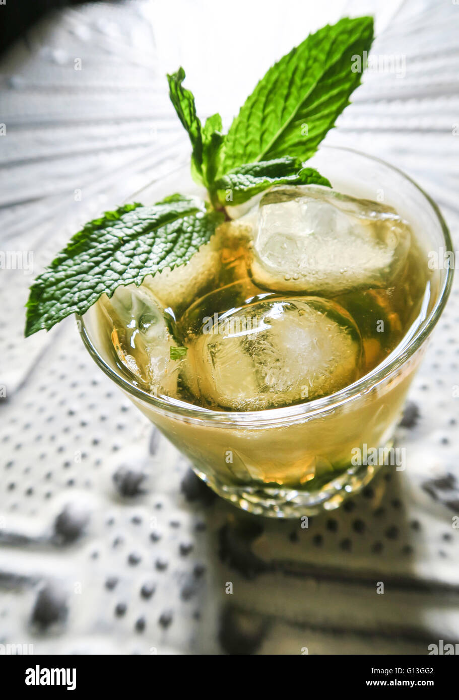 Mint Julep Cocktail in Crystal Glass with Sprig of Fresh Mint Garnish, USA Stock Photo