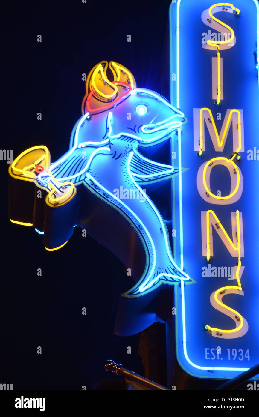 The 1934 neon sign with viking fish logo for Simon's pub in the north side Andersonville neighborhood of Chicago. Stock Photo