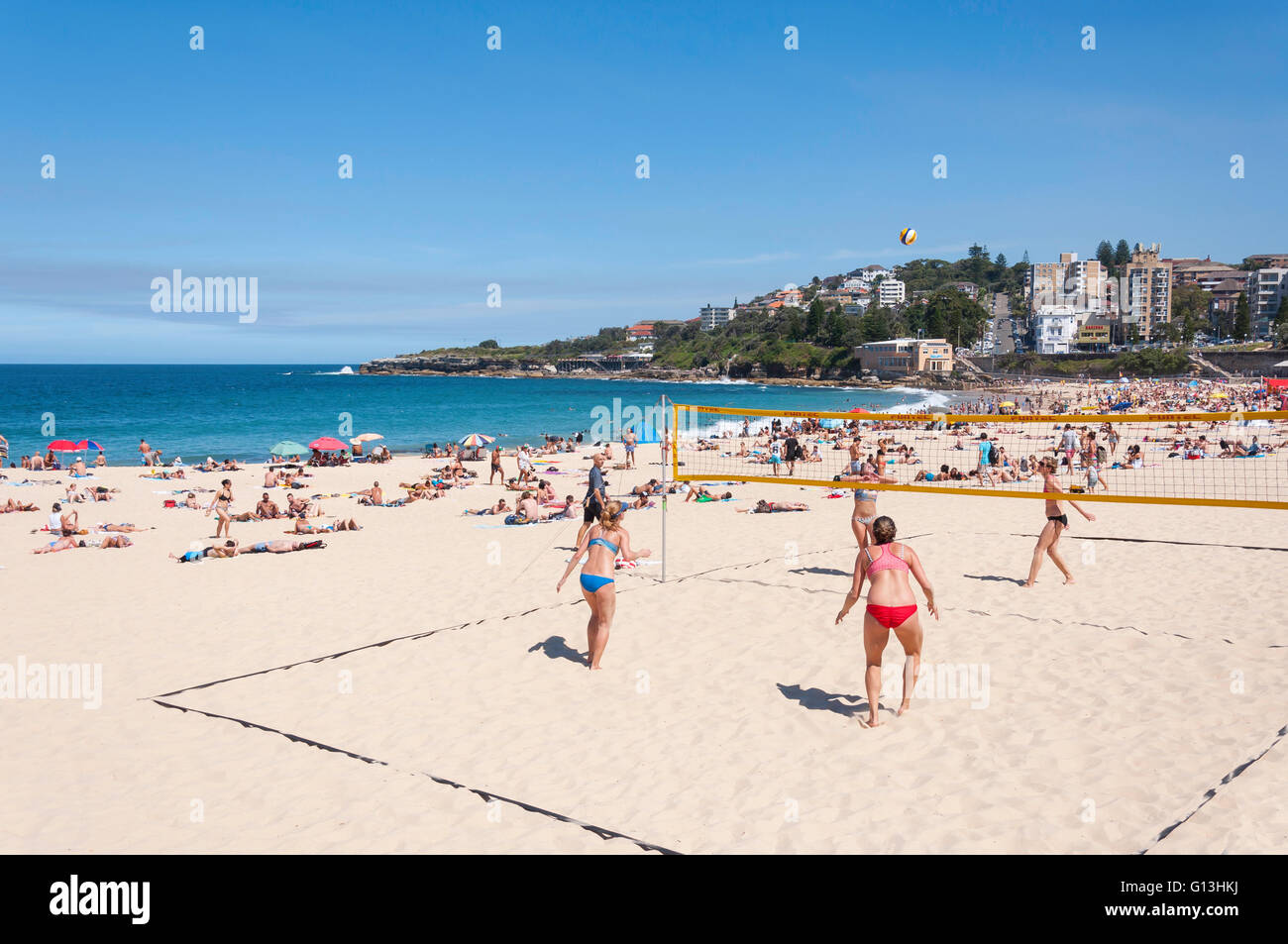 Women playing beach volleyball on Coogee Beach, Coogee, Sydney, New South Wales, Australia Stock Photo
