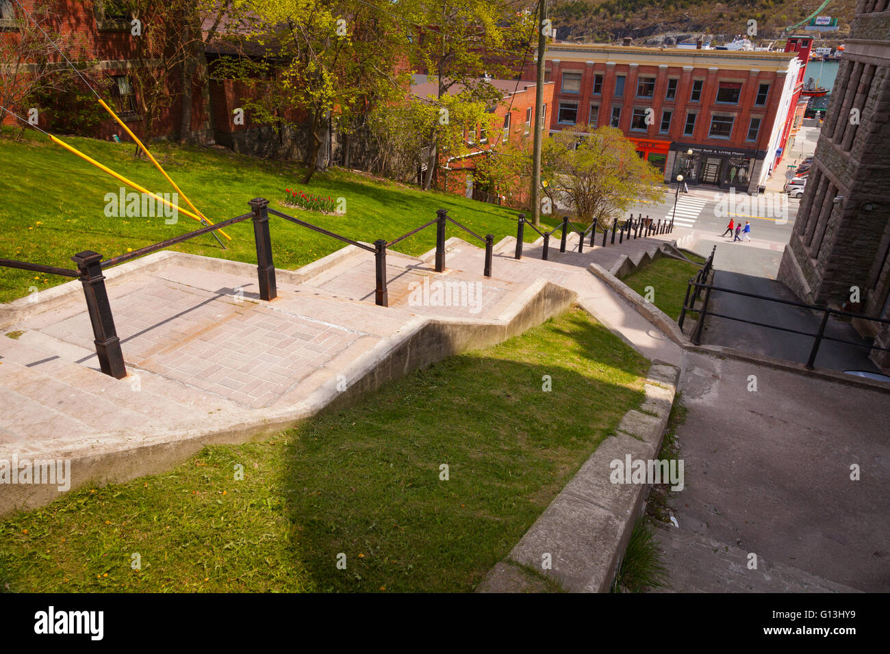 A long staircase leading down a hill towards the waterfront in downtown St. John's, Avalon Peninsula, Newfoundland, Canada. Stock Photo