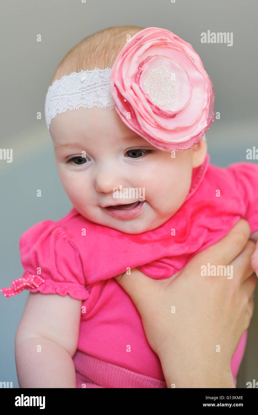 Mom keeps a baby daughter in her arms Stock Photo Alamy