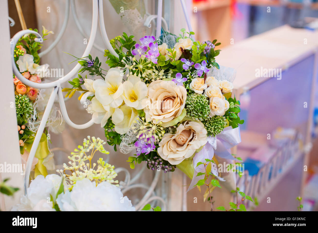 Wedding decoration of flowers for ceremony in restaurant Stock Photo