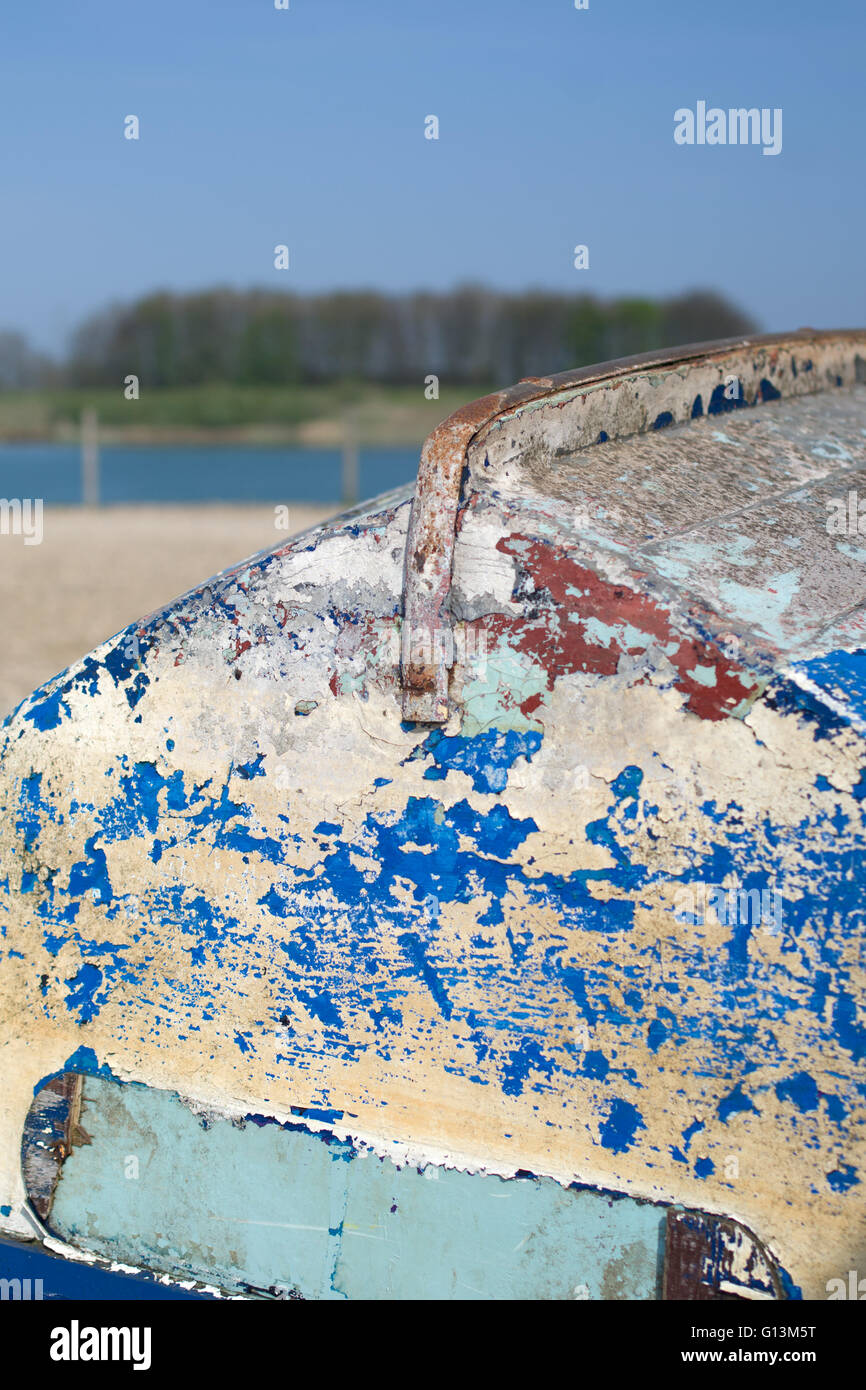 Worn paint and patina on upturned fiberglass boat Stock Photo Alamy
